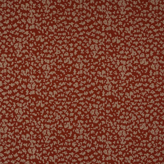 Rusty red woven fabric with small pale speckled abstract pattern