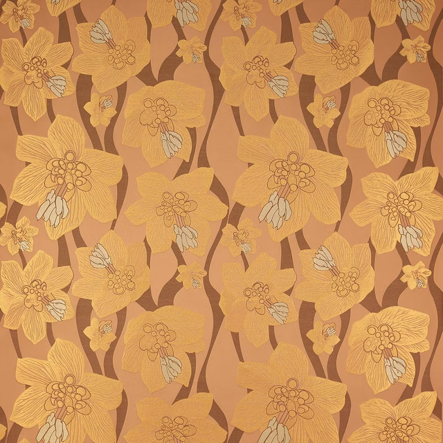 Large stylised floral fabric in copper, gold and cream on a terracotta ground