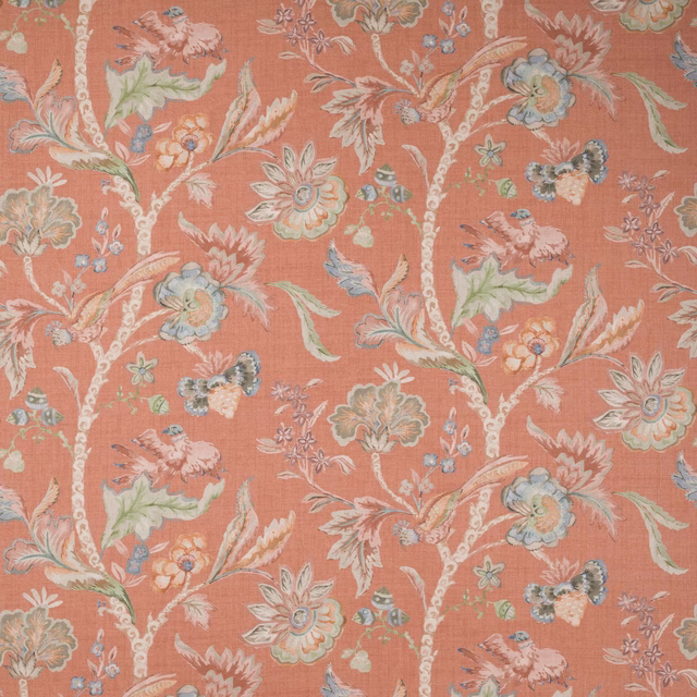 Coral-red linen fabric with large painterly floral branches and soft pastel highlights