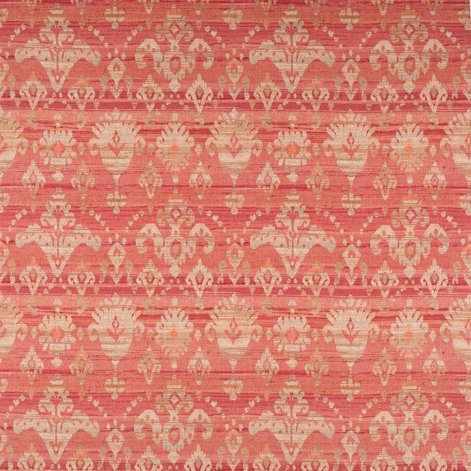 Coral red damask fabric with blush-gold motif and slubbed woven texture