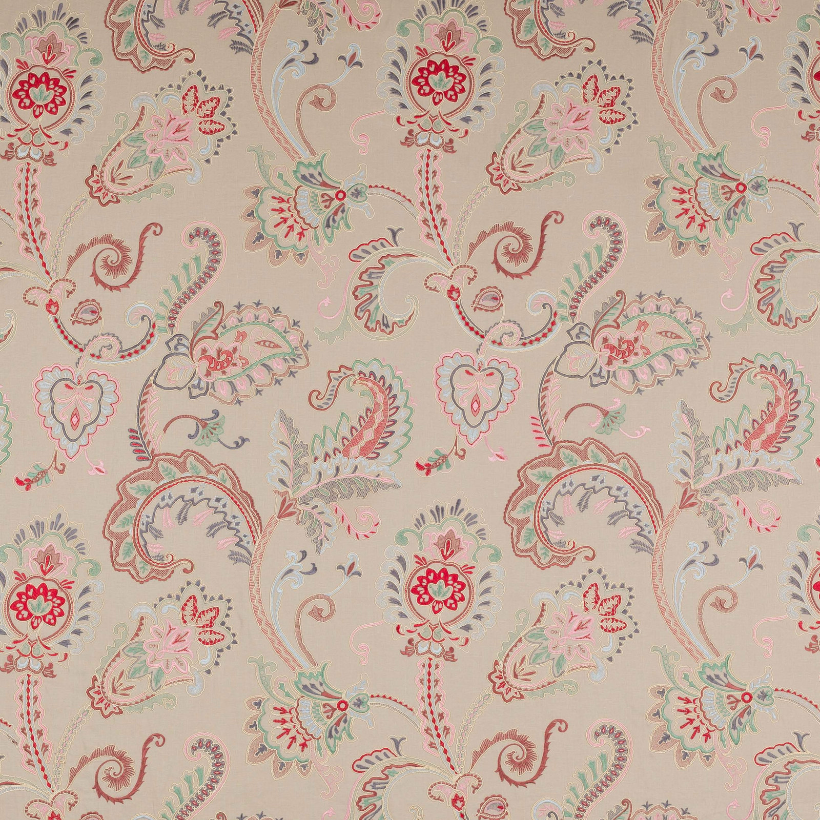 Cream patterned fabric with red, sage and blush scrolling floral motifs