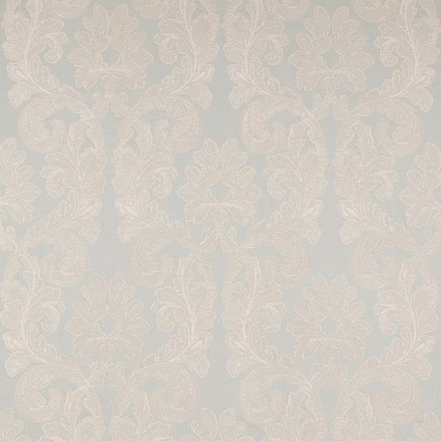 Pale dusty blue damask fabric with ivory floral scrolls and subtle woven texture