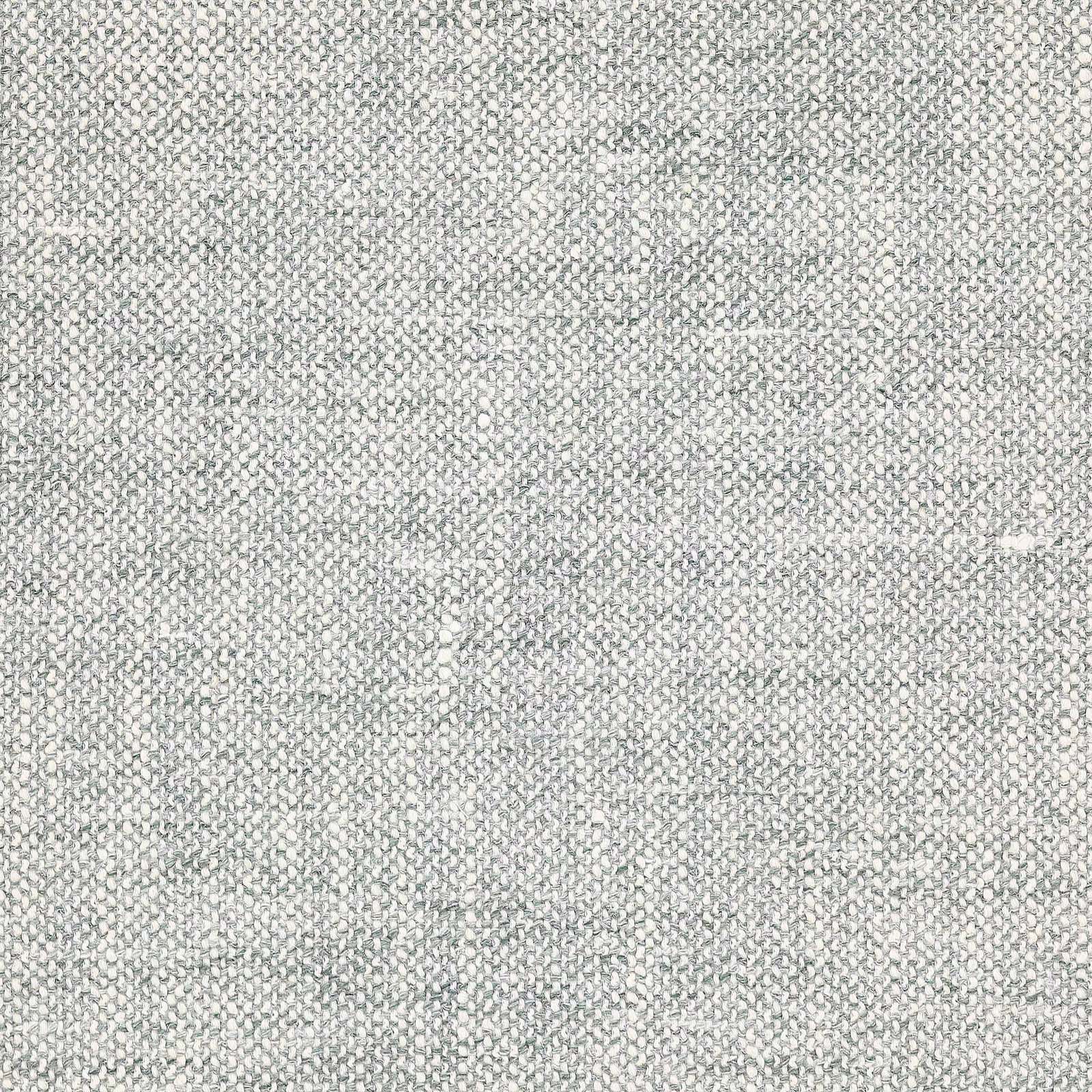 Close-up of a pale eucalyptus green textured woven fabric with fine slubbed flecks