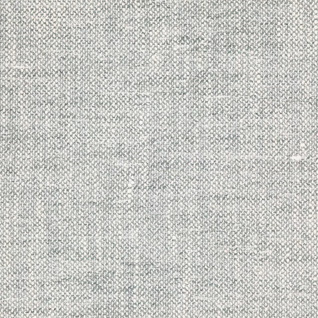 Close-up of a pale eucalyptus green textured woven fabric with fine slubbed flecks