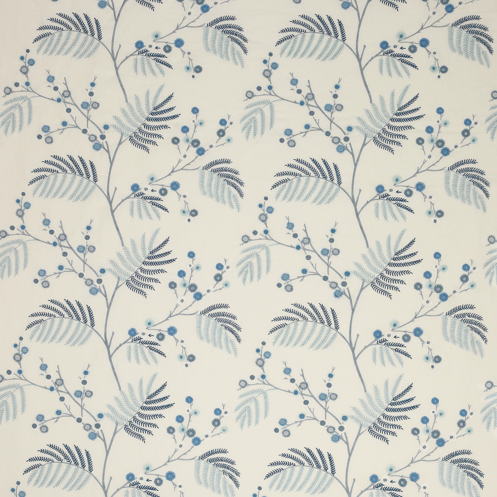 Pale cream botanical fabric with soft blue berries, navy leaves and trailing branches