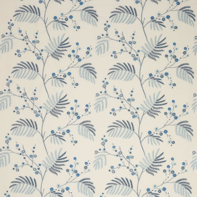 Pale cream botanical fabric with soft blue berries, navy leaves and trailing branches