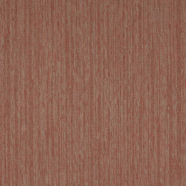 Close-up of muted brick-red herringbone weave fabric with fine texture