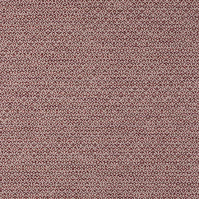 Close-up of a small geometric woven fabric in muted berry red and cream