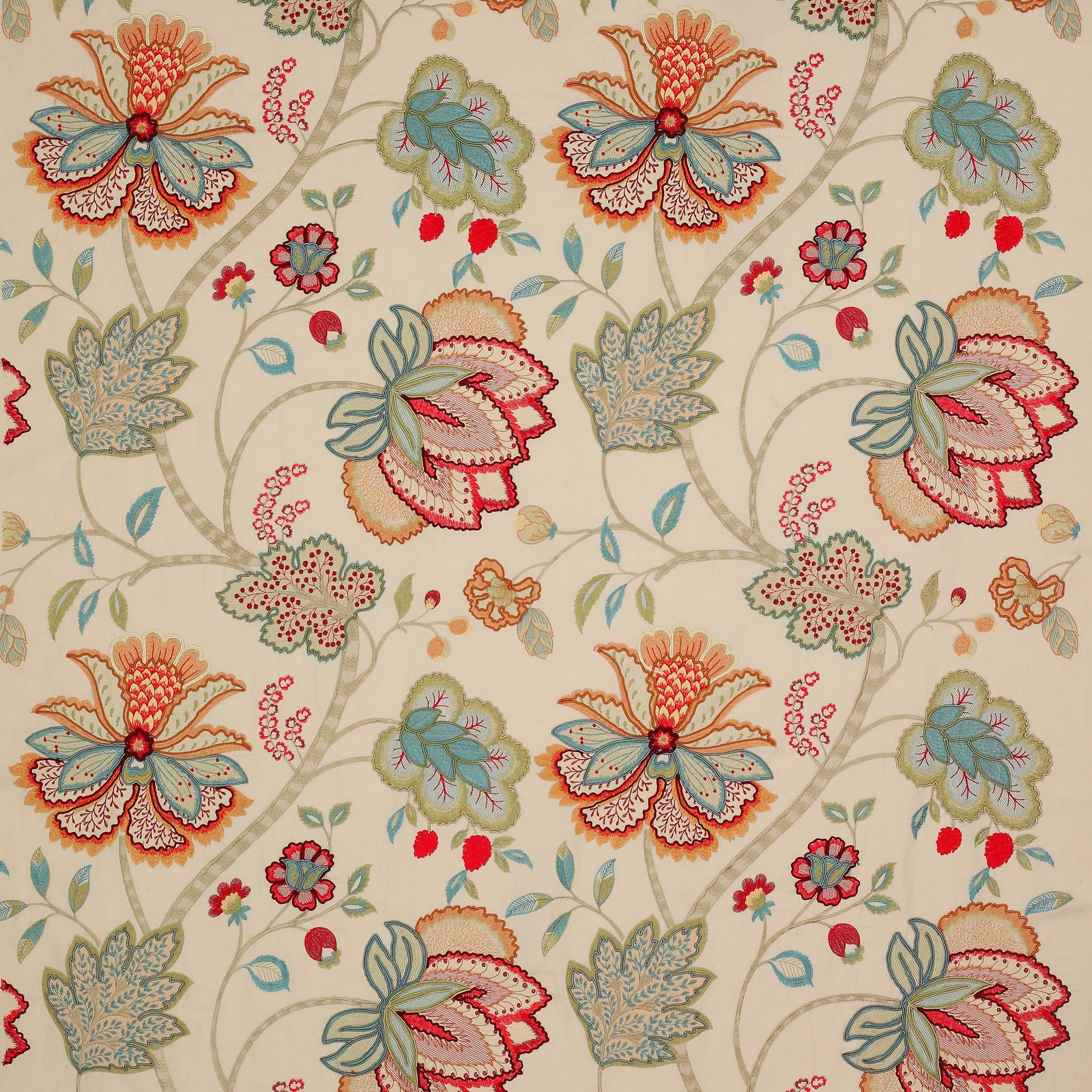 Large embroidered floral fabric on warm cream ground with red and sage blooms