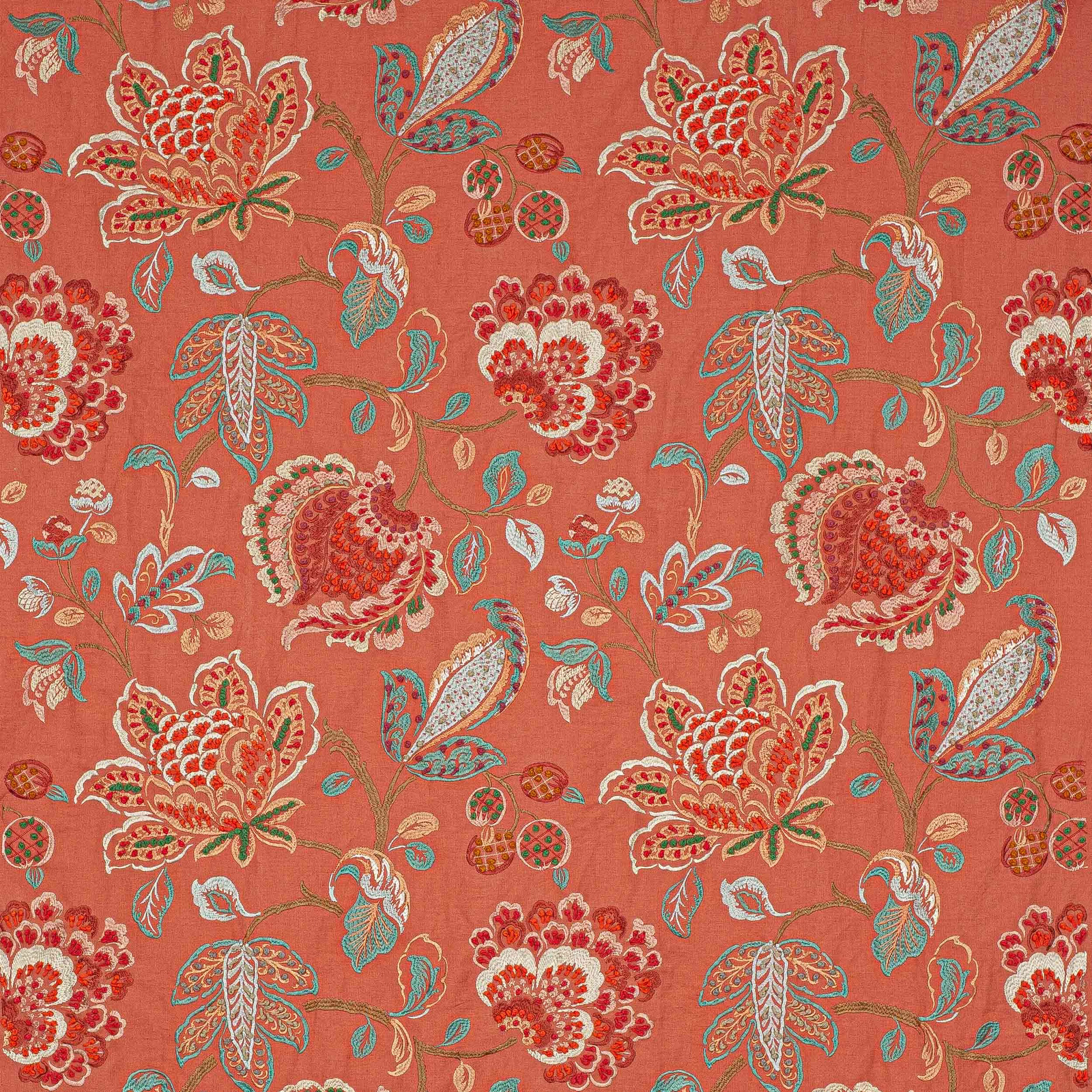 Coral-red floral fabric with large embroidered-look blossoms and trailing leaves
