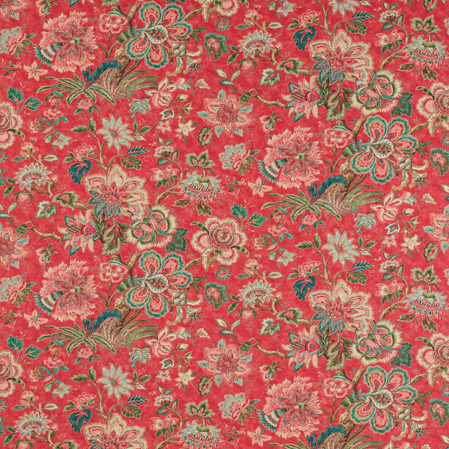 Coral-red floral linen with green and teal blossoms and leafy trailing stems