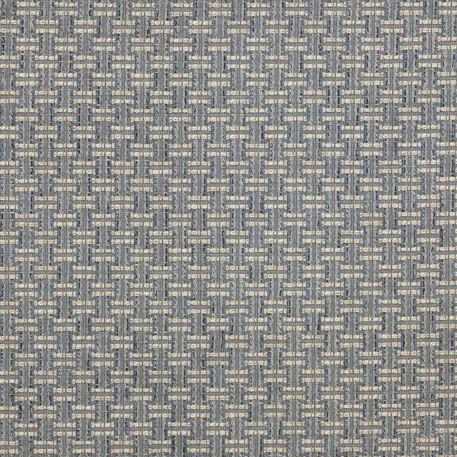 Close-up of a small geometric woven fabric in muted blue-grey tones