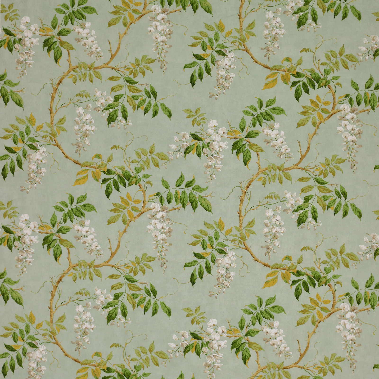 Trailing botanical fabric on a soft aqua ground with green leaves and white blossom