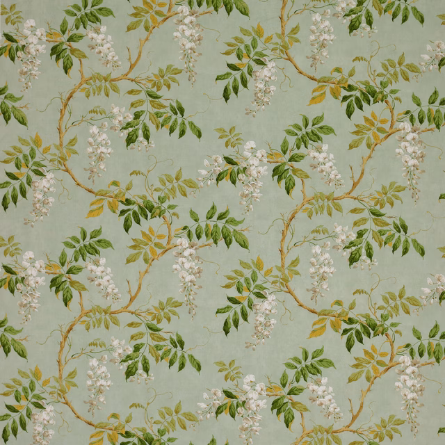 Trailing botanical fabric on a soft aqua ground with green leaves and white blossom
