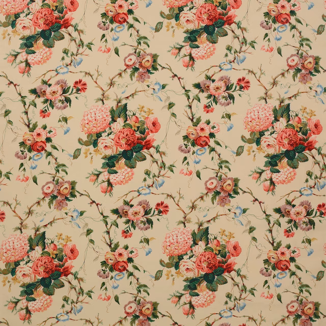 Large pink floral bouquets and green foliage on a warm cream cotton ground