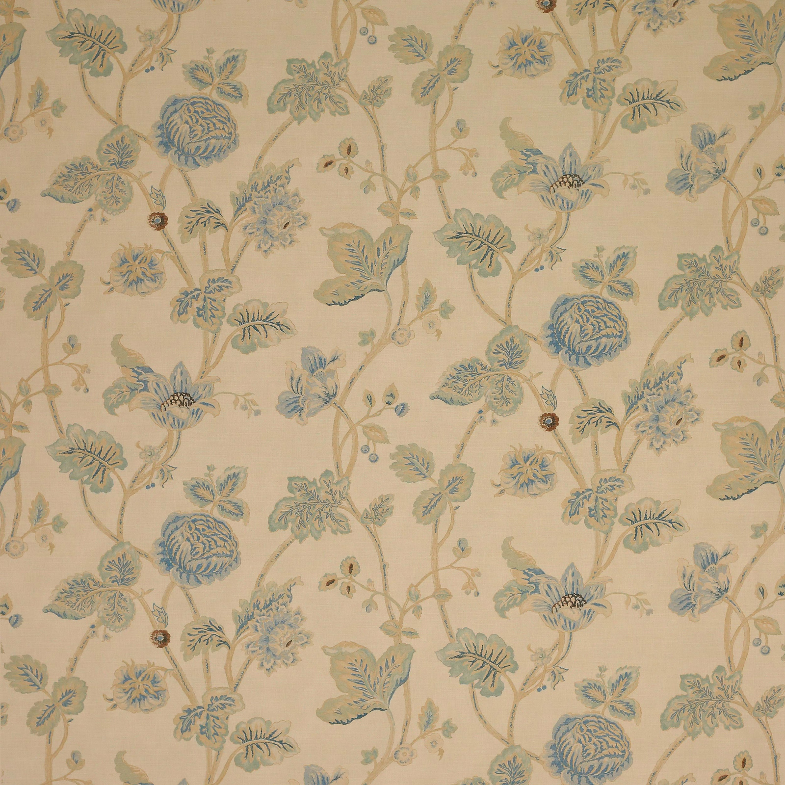 Cream-ground floral fabric with soft blue blossoms and trailing leafy stems