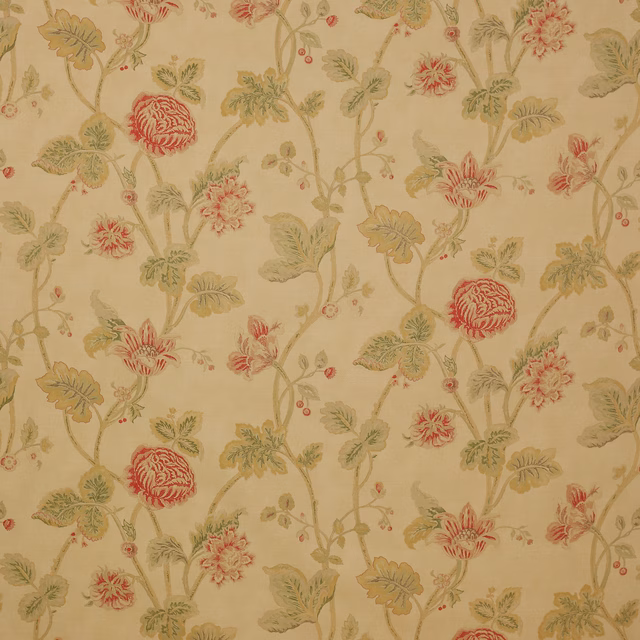 Cream floral fabric with red blooms and soft green trailing leaves