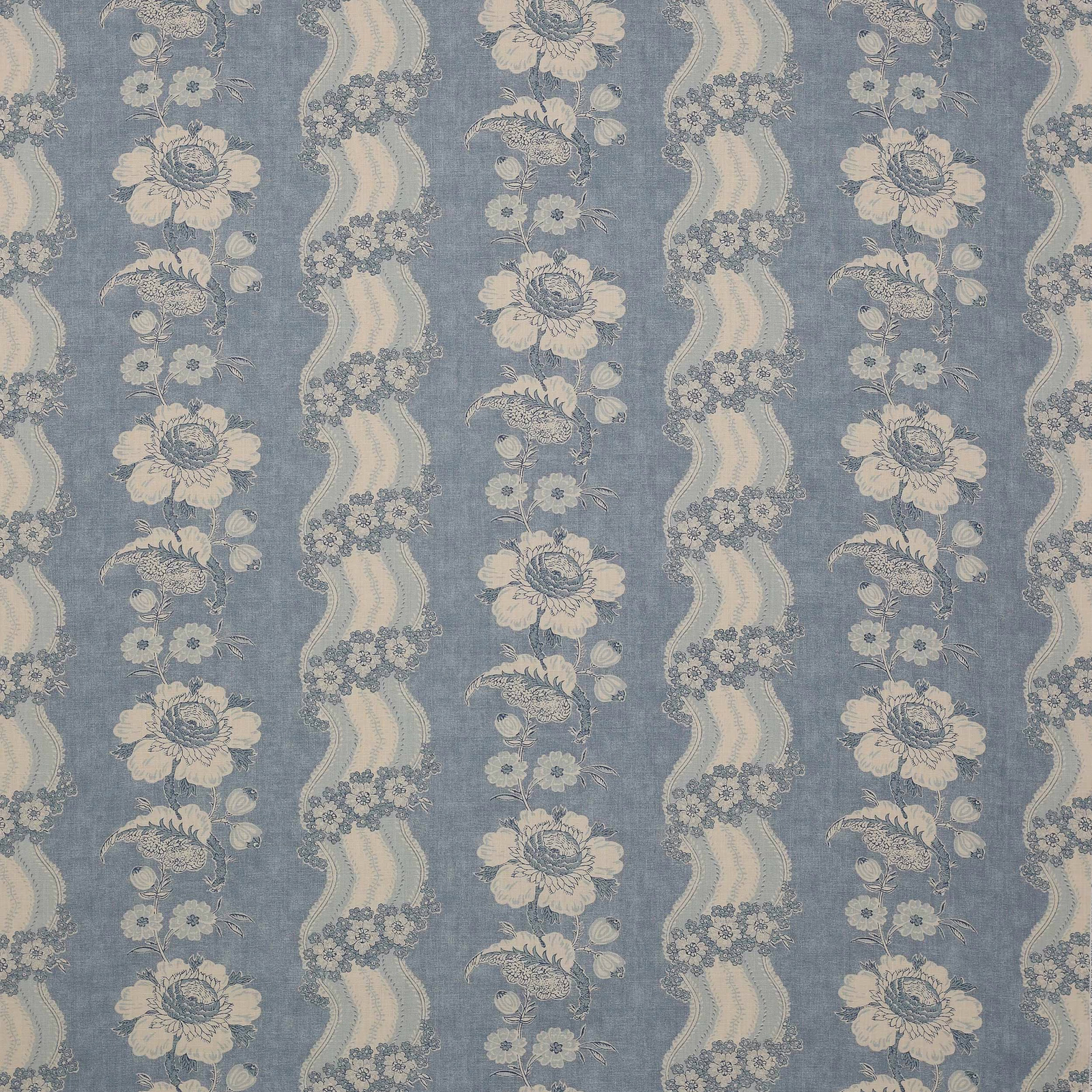 Blue linen fabric with cream floral stripes and a soft woven texture