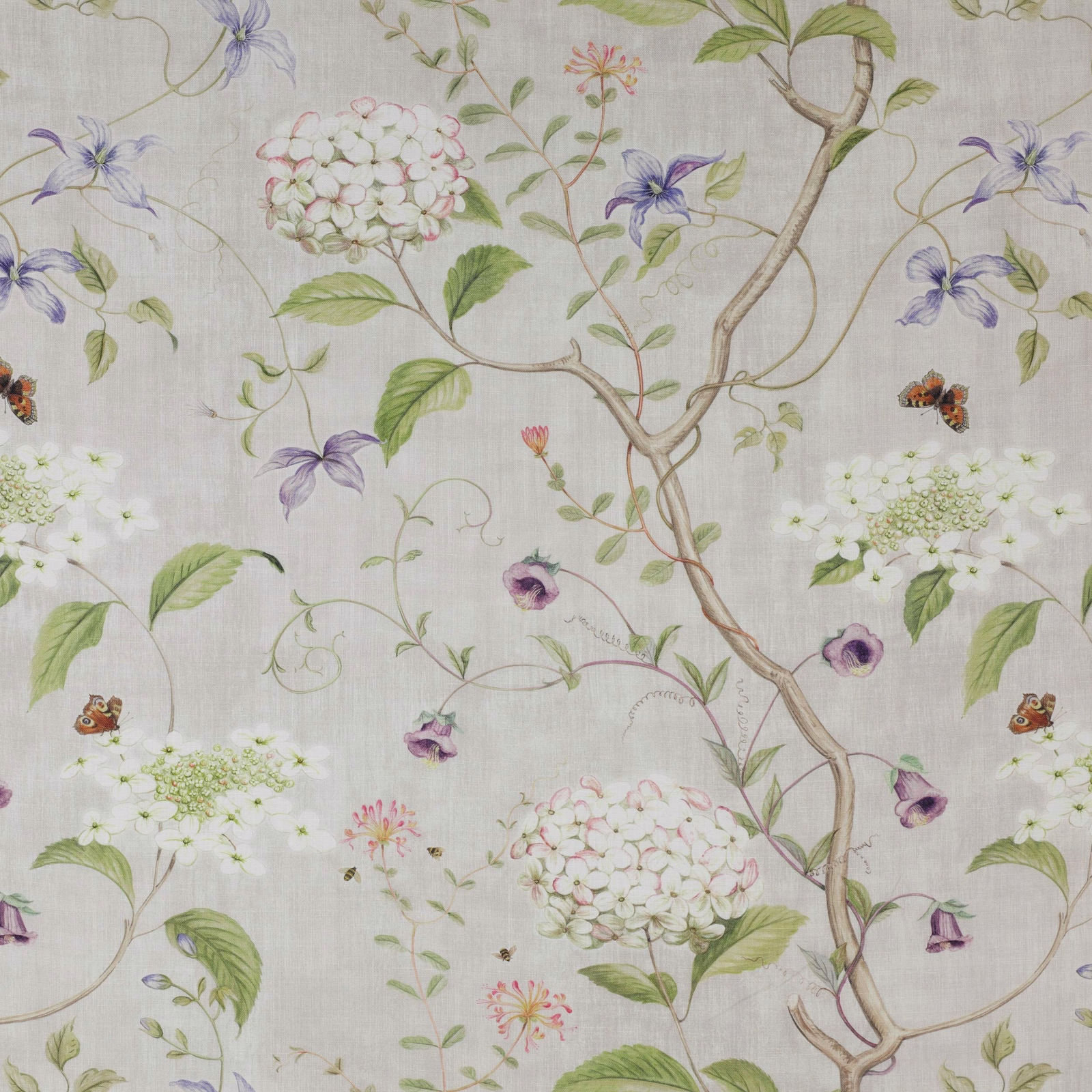 Beige linen floral fabric with lilac blossoms, green leaves and trailing branches