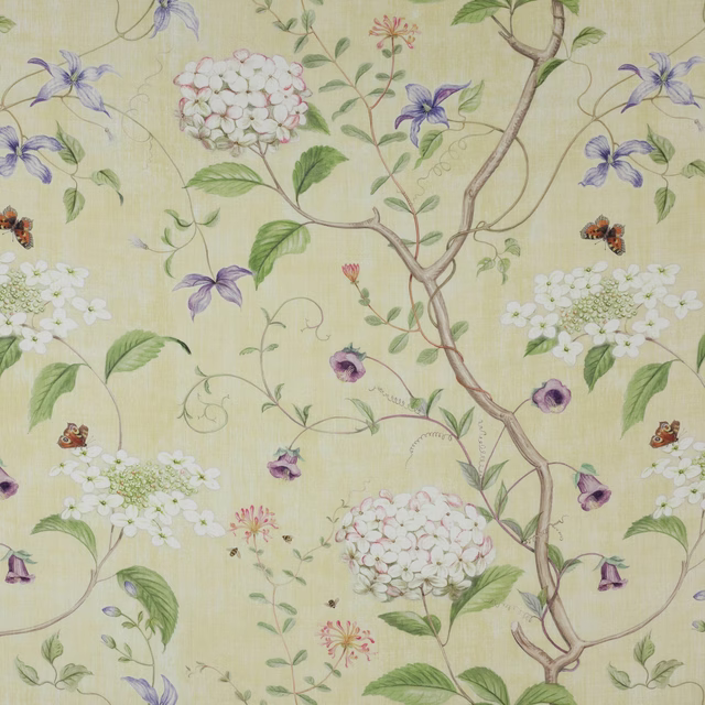 Pale yellow linen fabric with botanical flowers, lilac petals and green leaves