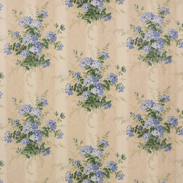 Blue and green floral chintz print on a creamy beige cotton ground