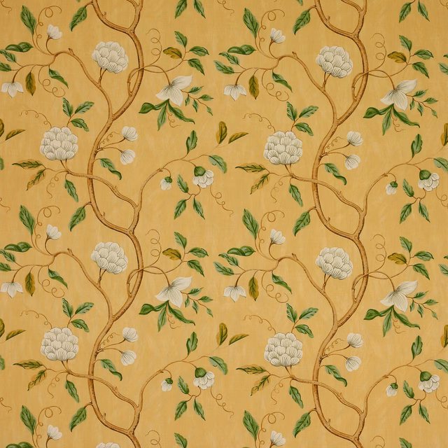Gold linen fabric with scrolling branches, white blossoms and green leaves