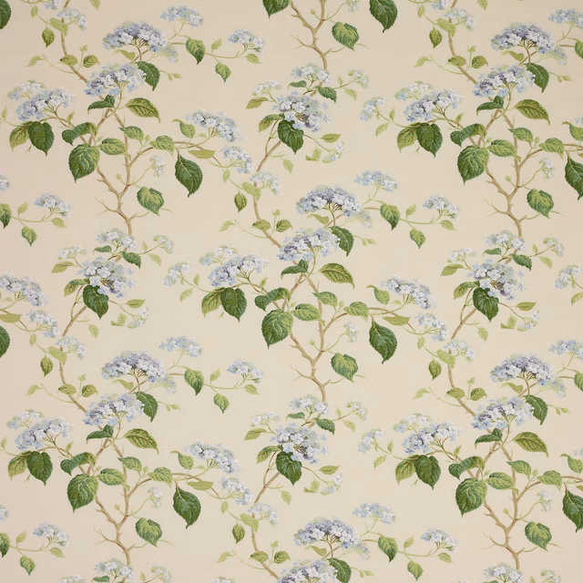 Cream floral fabric with pale blue blossoms and green leafy stems