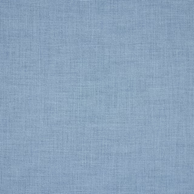 Close-up of soft powder blue linen weave with fine natural slubs