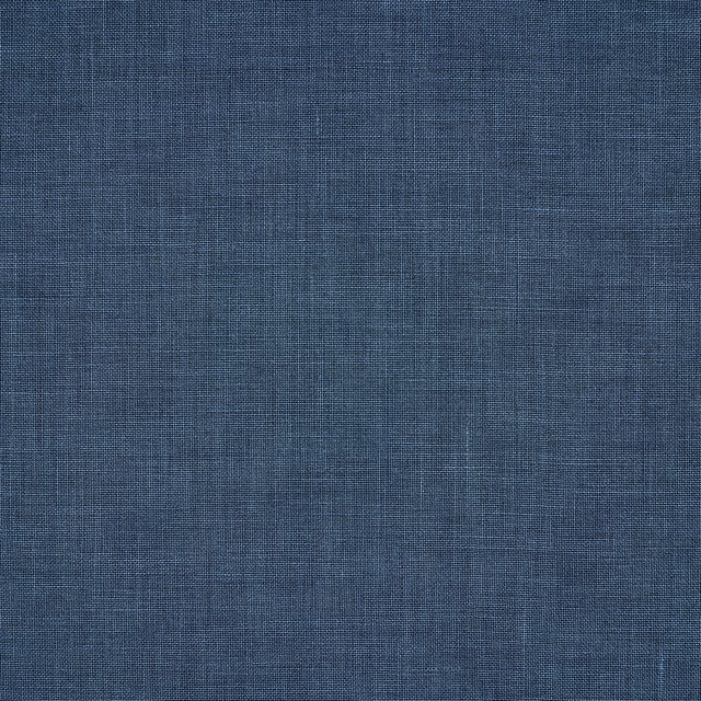 Muted blue linen fabric with a fine plain weave and soft tonal texture