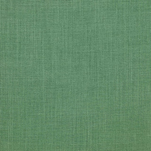 Fresh apple green linen fabric with a fine plain weave and subtle slub texture
