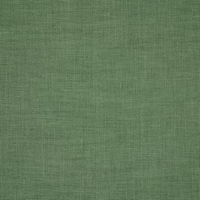 Close-up of soft sage green linen fabric with a fine plain weave