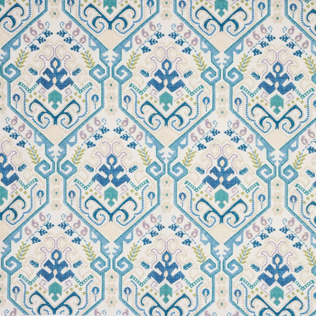 Blue and aqua geometric octagons on a pale ivory woven fabric swatch