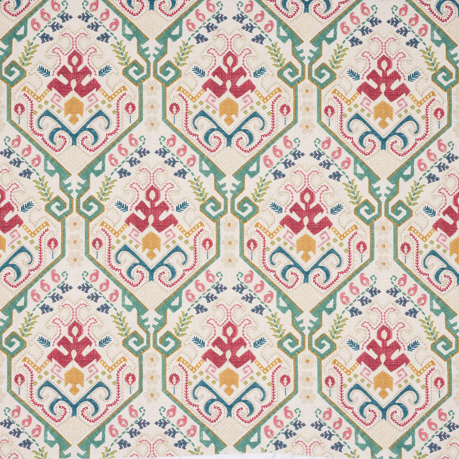 Cream patterned fabric with large geometric medallions in green, pink, teal and mustard