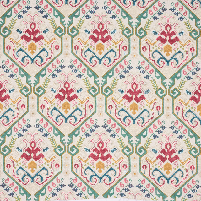 Cream patterned fabric with large geometric medallions in green, pink, teal and mustard