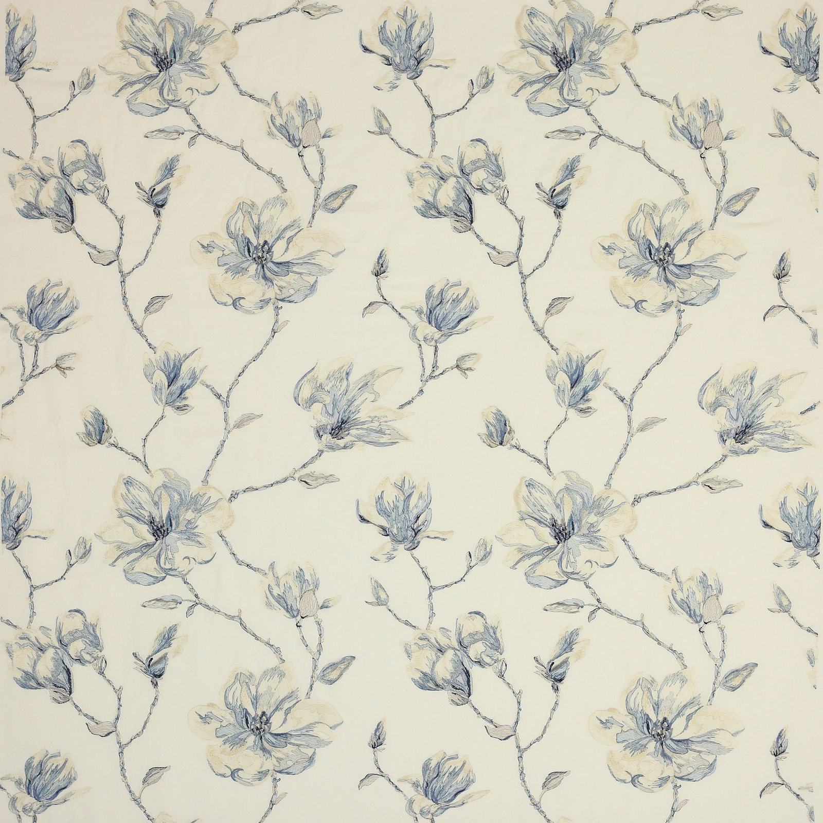 Pale cream fabric with large sketchy blue floral branches and soft ivory-blue blossoms
