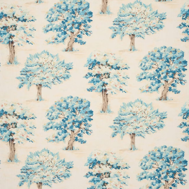 Blue painterly tree motif on a warm ivory cotton ground