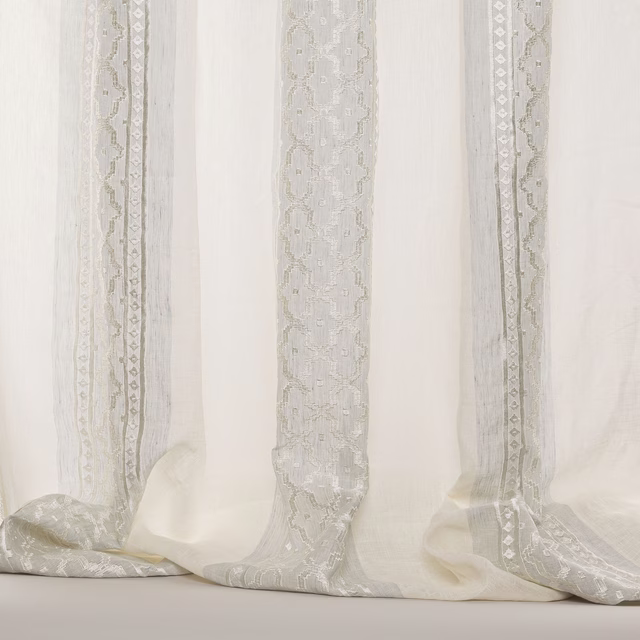 Sheer striped fabric in soft old blue with pale woven decorative bands