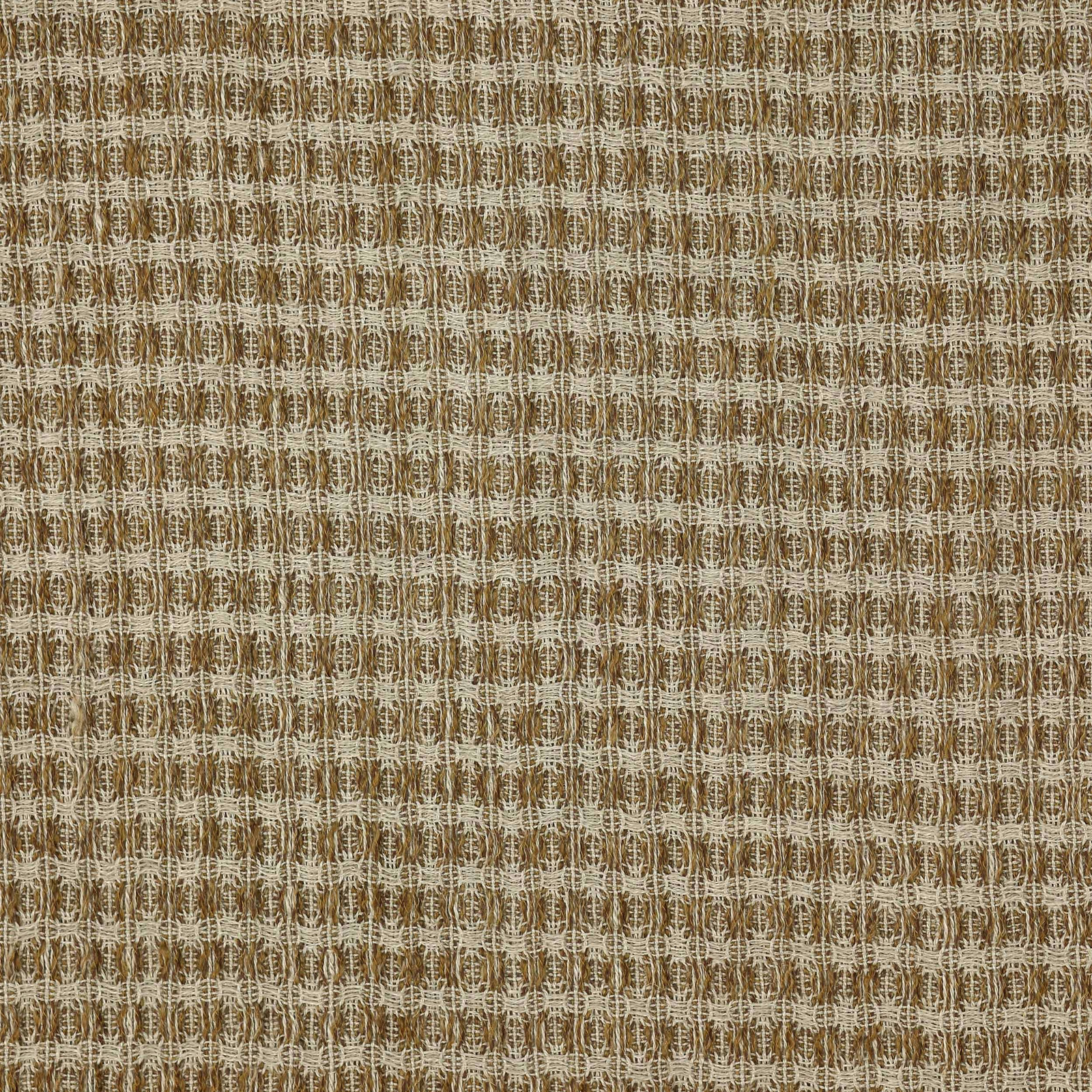 Close-up of a small geometric woven fabric in warm tobacco brown and flax tones