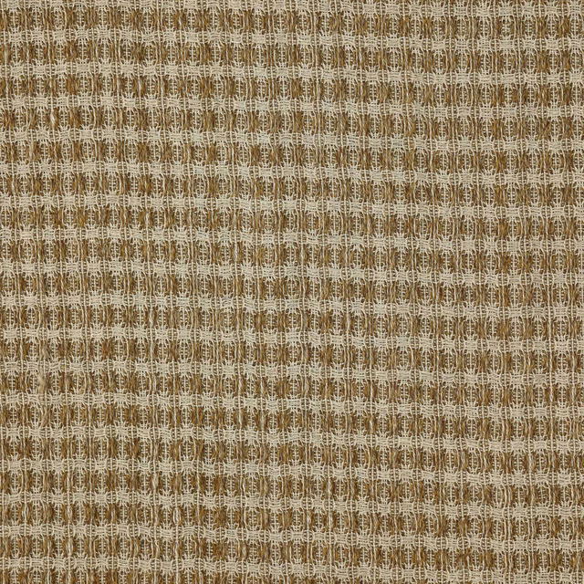 Close-up of a small geometric woven fabric in warm tobacco brown and flax tones