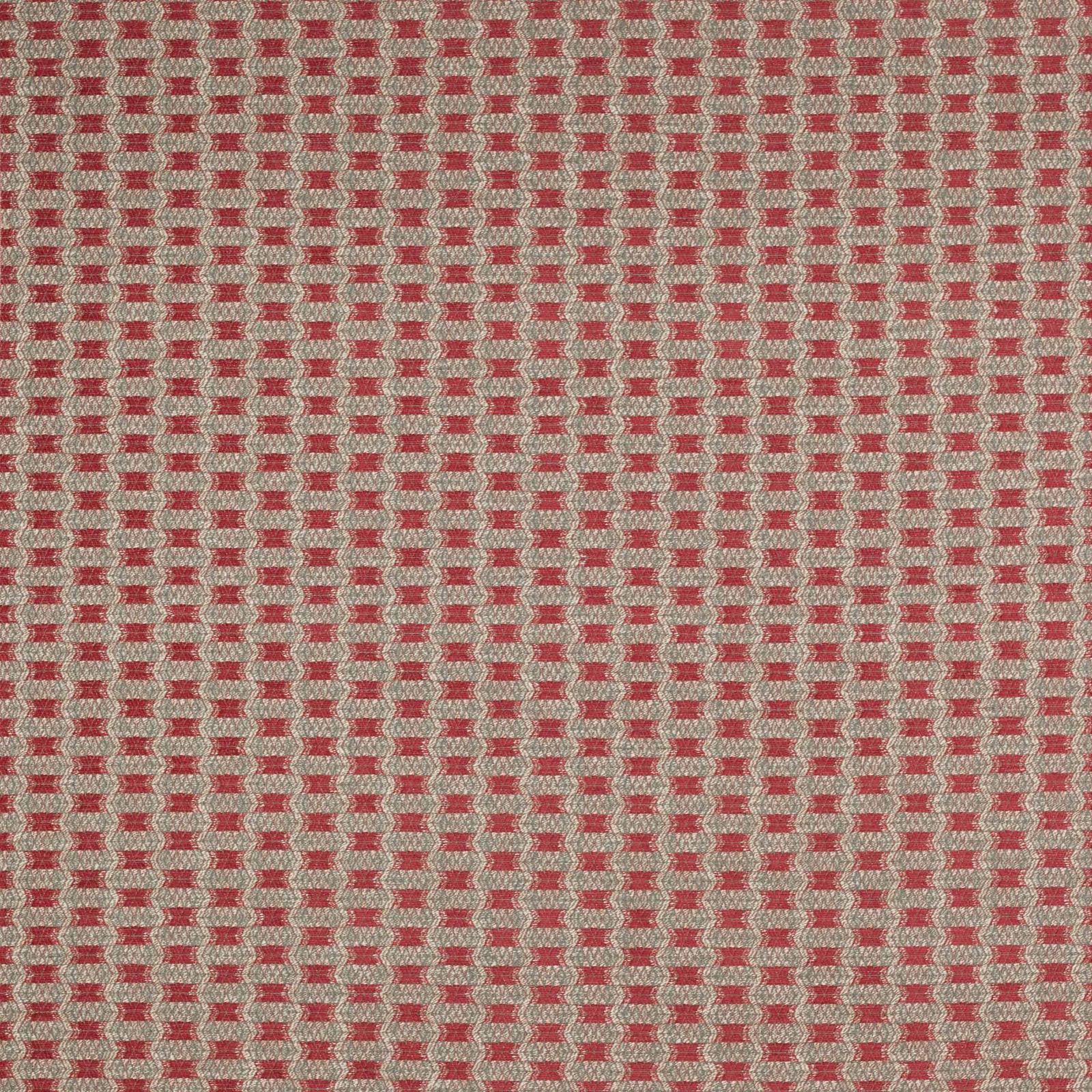 Close-up of small geometric woven fabric in coral red and natural beige