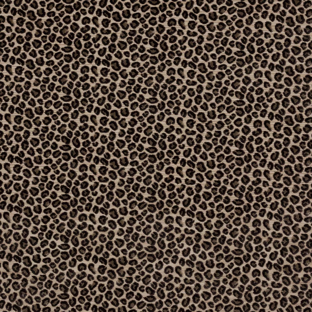 Small charcoal leopard spots on a warm taupe fabric swatch