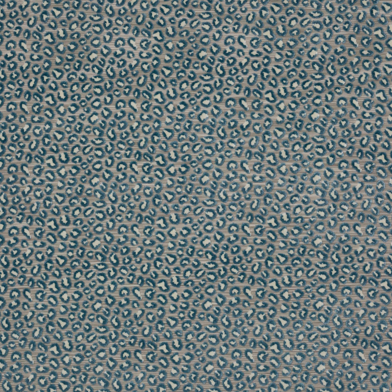 Small-scale blue leopard spot on a pale woven ground