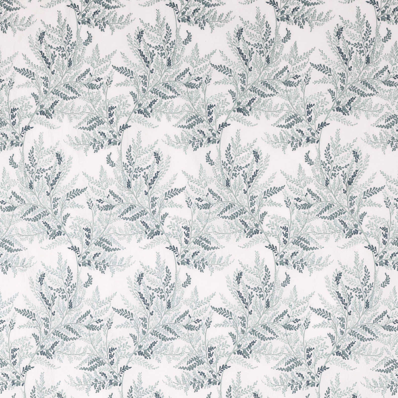 Pale botanical fabric with glacier blue leaf sprays on an ivory ground
