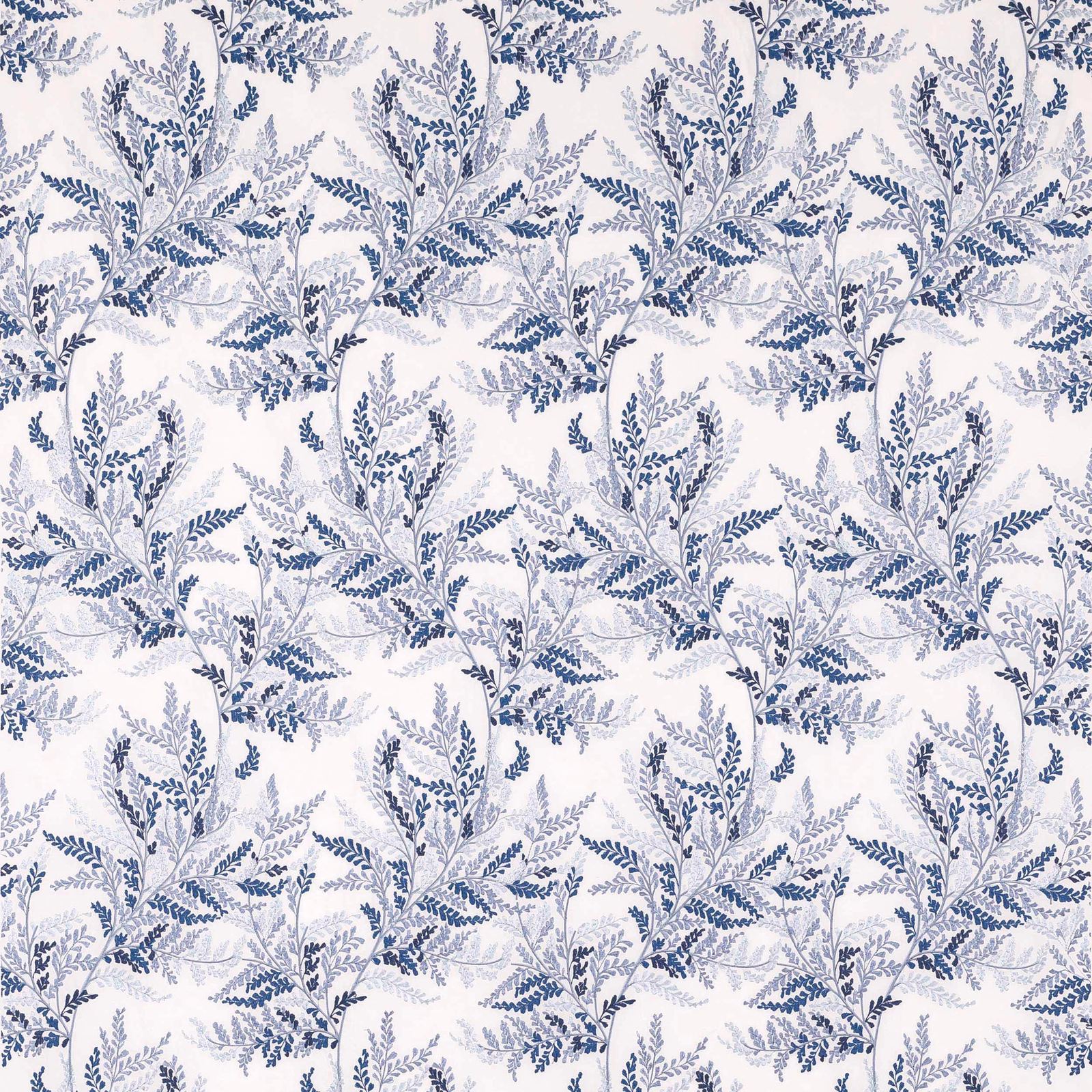 Blue botanical leaf pattern on ivory fabric with a soft woven sheen