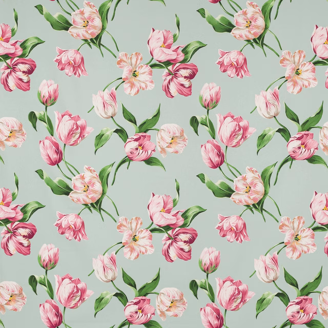 Painterly pink and green floral cotton on a pale mint ground
