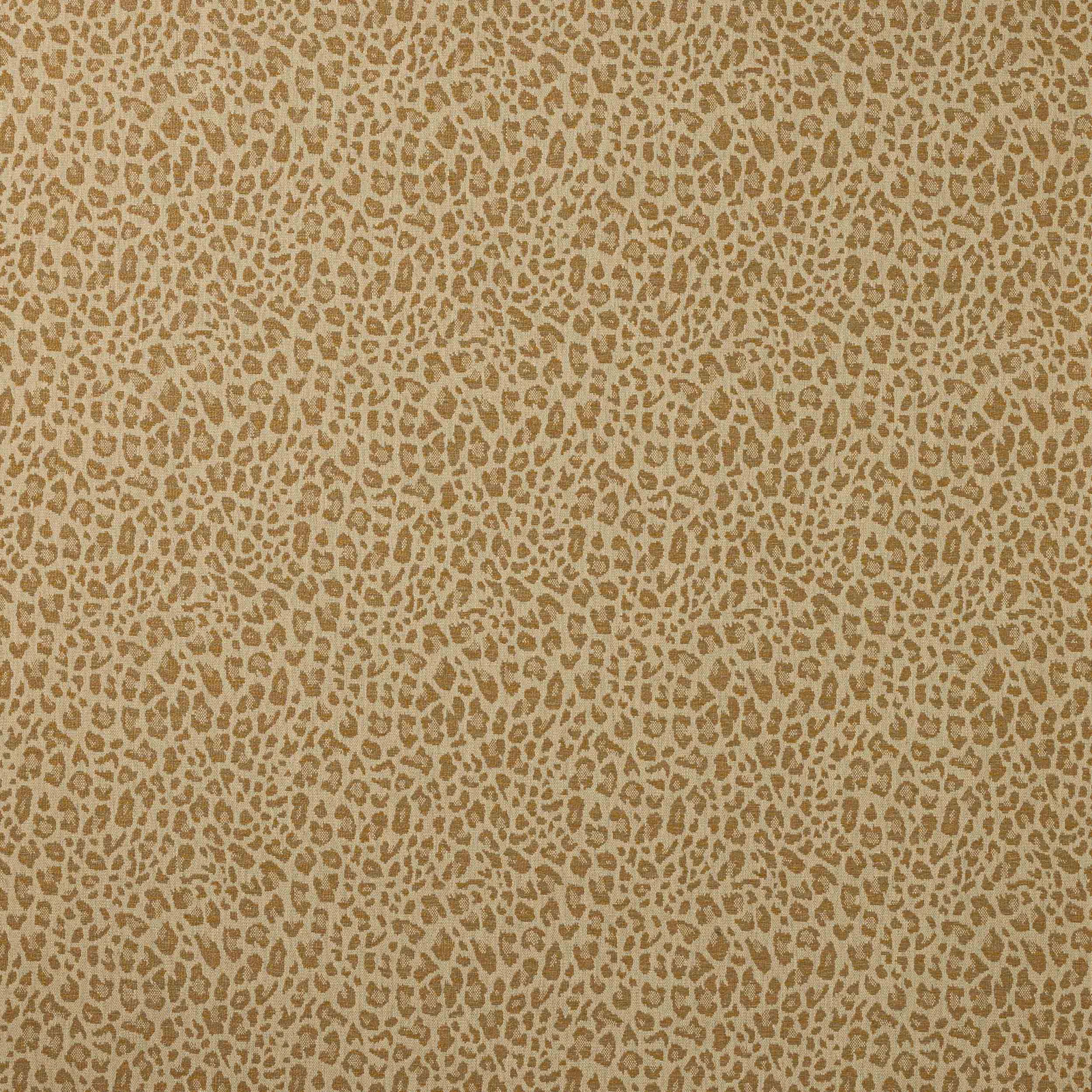 Close-up of small animal pattern in warm gold and beige woven fabric