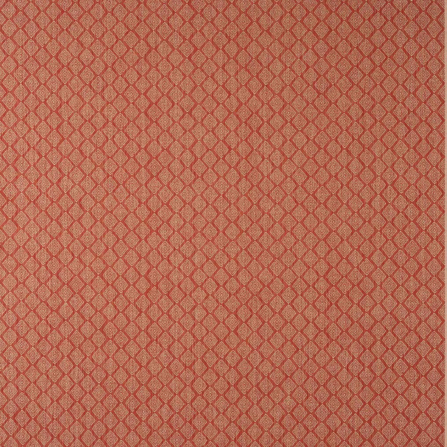 Close-up of a small diamond geometric fabric in muted terracotta red