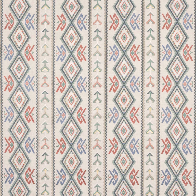 Pale geometric fabric with aqua, coral, blue and sage diamond motifs