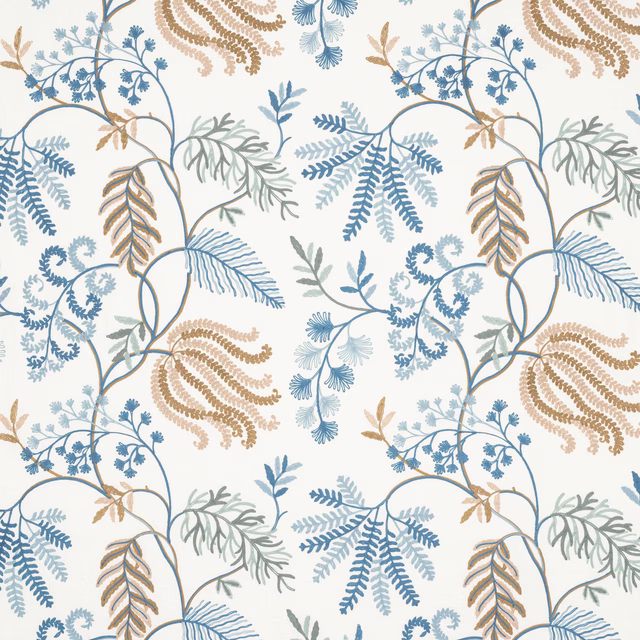 Botanical fabric swatch with blue and tan fern leaves on an ivory ground