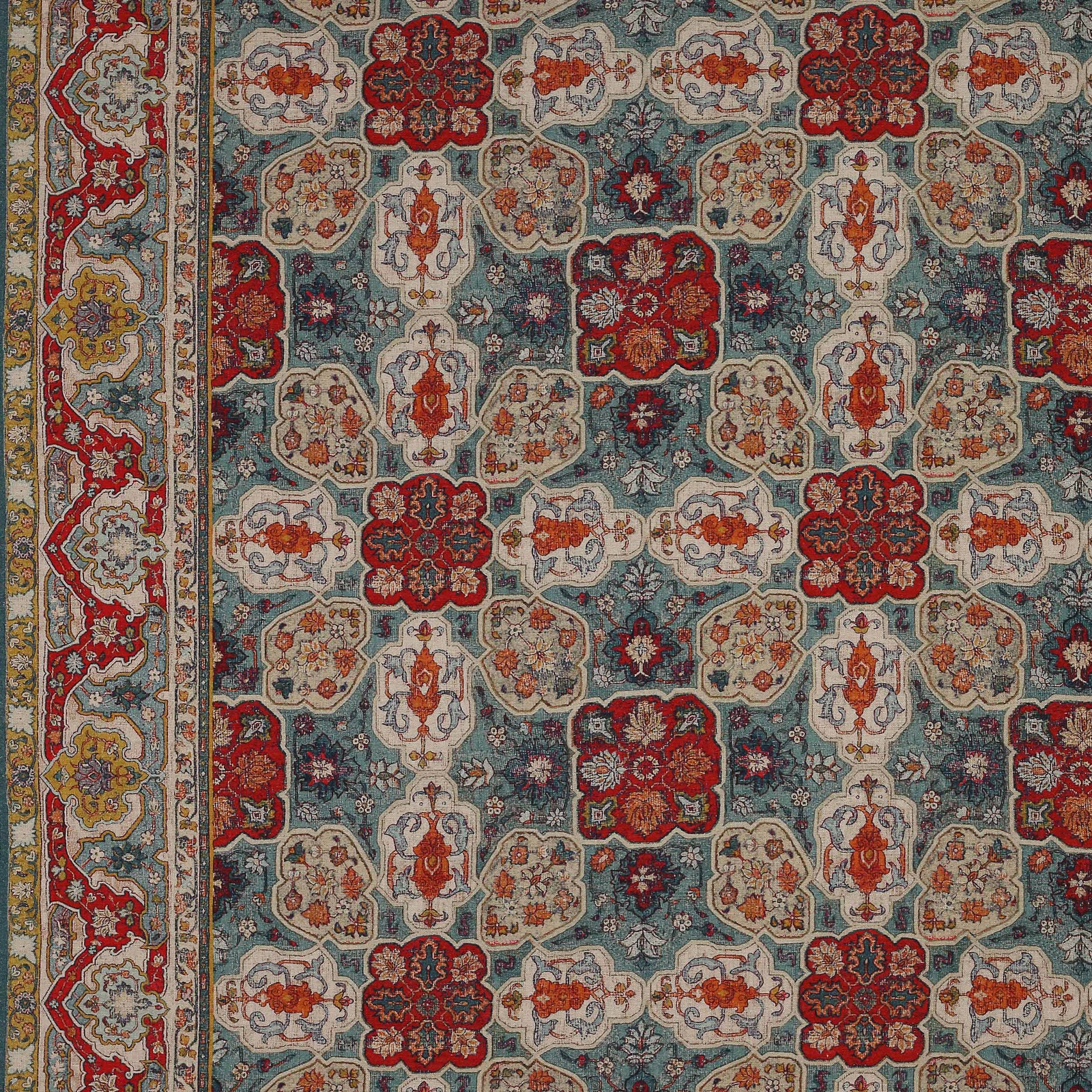 Patterned fabric swatch with red medallions on an aqua ground and ivory detailing